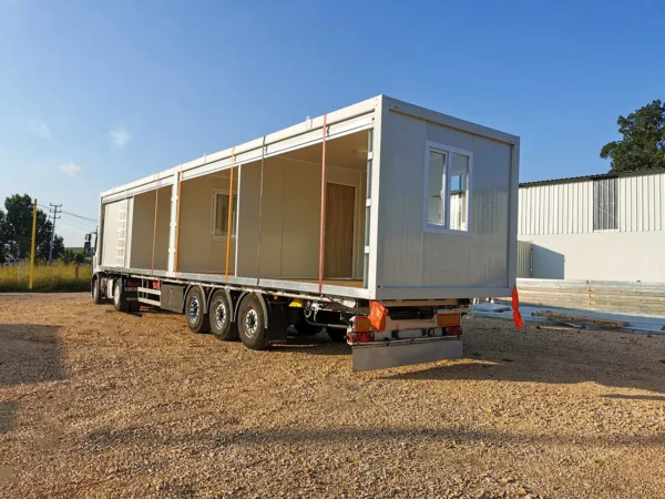 9ac816_3df17cb489774213b81a6f3367fc8527mv2-600x450-1.webp Containerhaus mit 2 Schlafzimmern – Bild 3